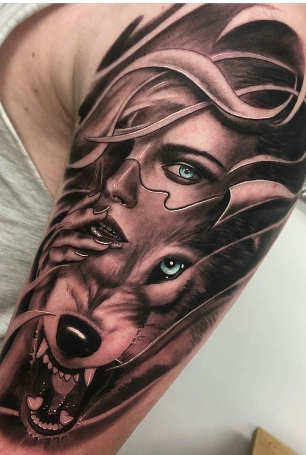 Hình xăm bắp tay nữ cô gái cùng chú sói đầy cuốn hút.